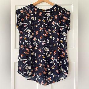 Navy blue flower print sheer top.